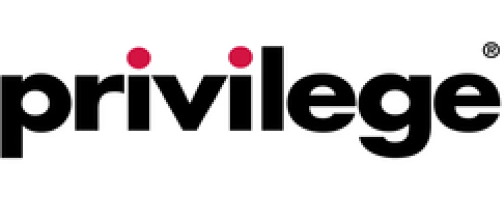 Logo of Privilege, featuring the word "privilege" in bold black letters with two red dots above the "i".