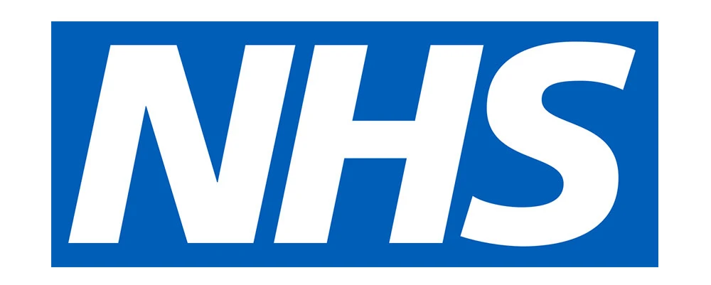 NHS logo in bold white letters against a blue background, representing healthcare services and branding in the context of market research by Brandspeak.